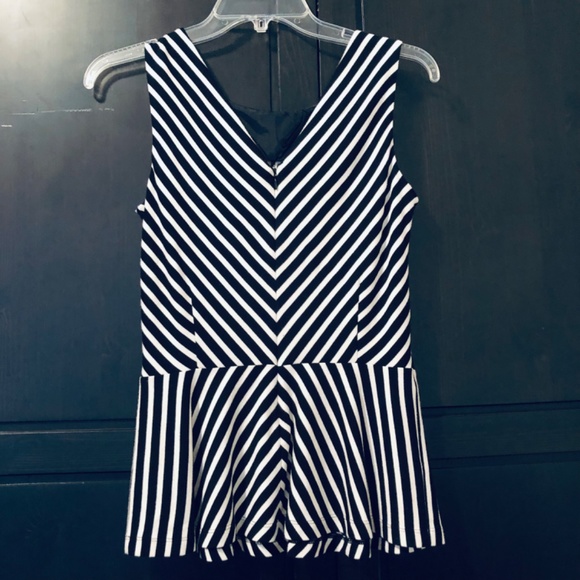 Sleeveless Peplum Top - Picture 3 of 7